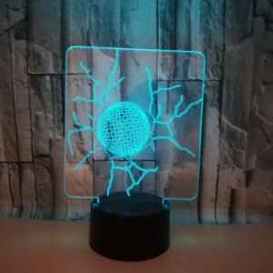 Golf 3D lampe. Golfbold der sidder i krakeleret glas. Farveskift mellem 7 farver. -